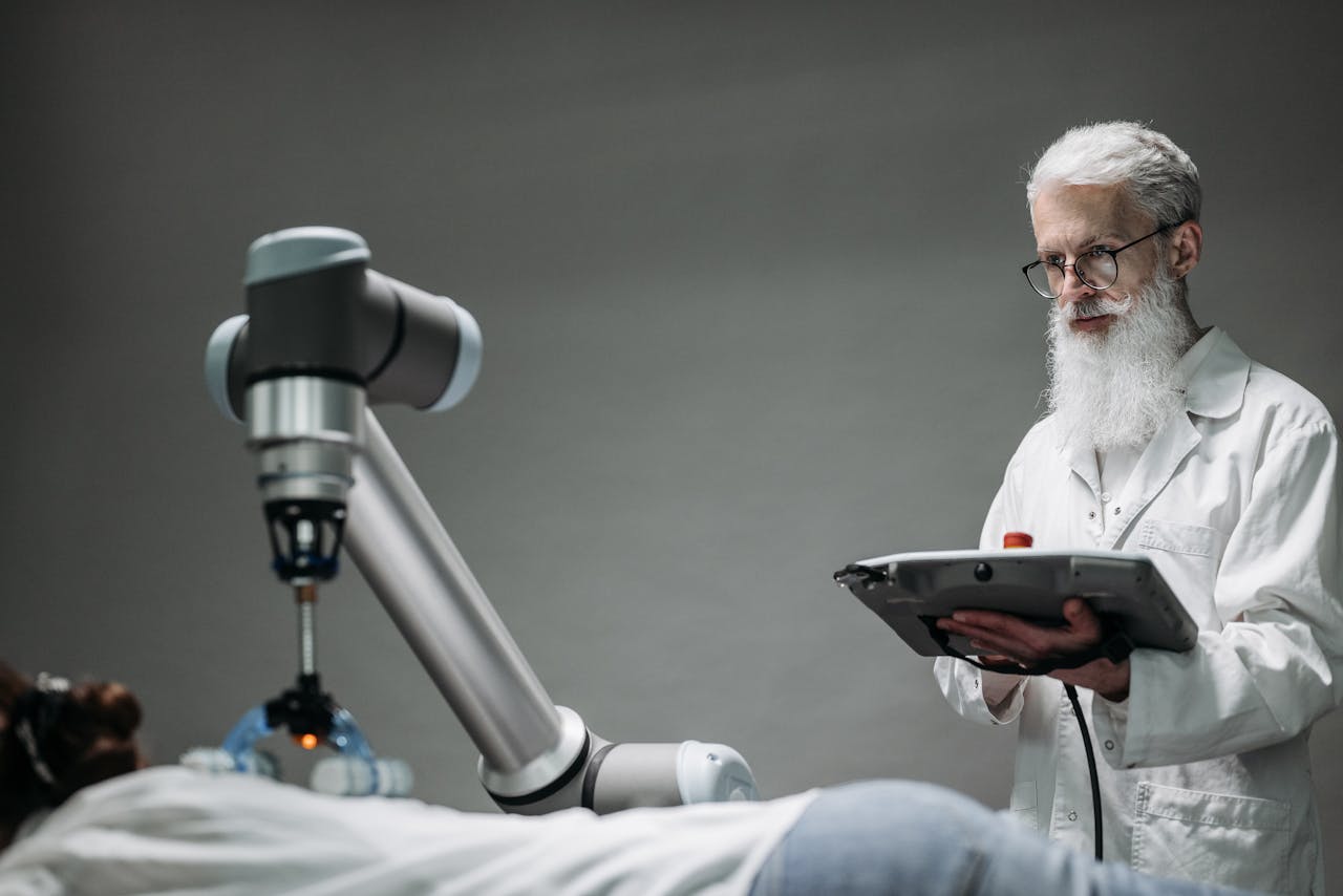 Senior scientist observing robot performing a task indoors.